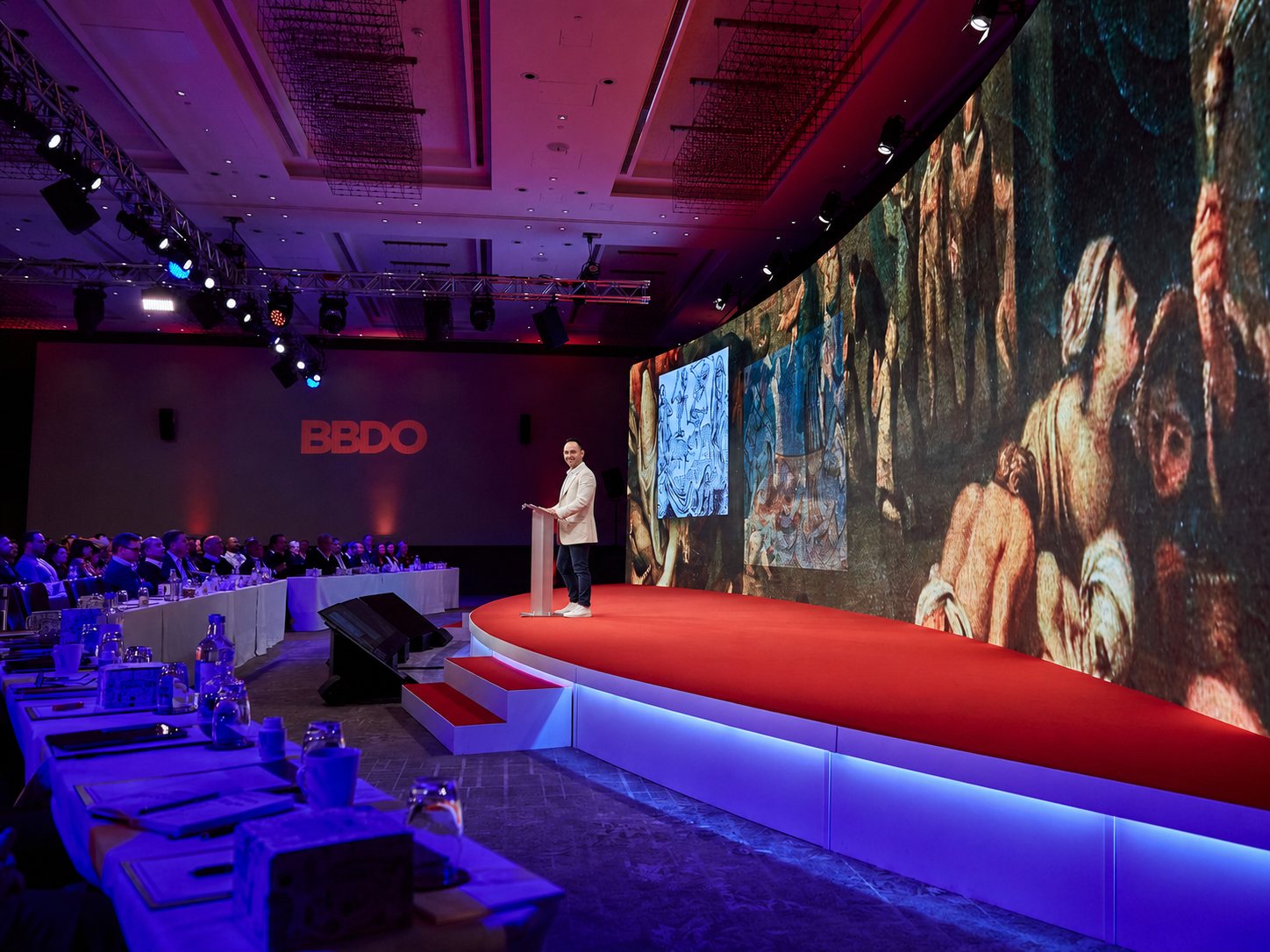 Marc Calamia on stage at a BBDO event